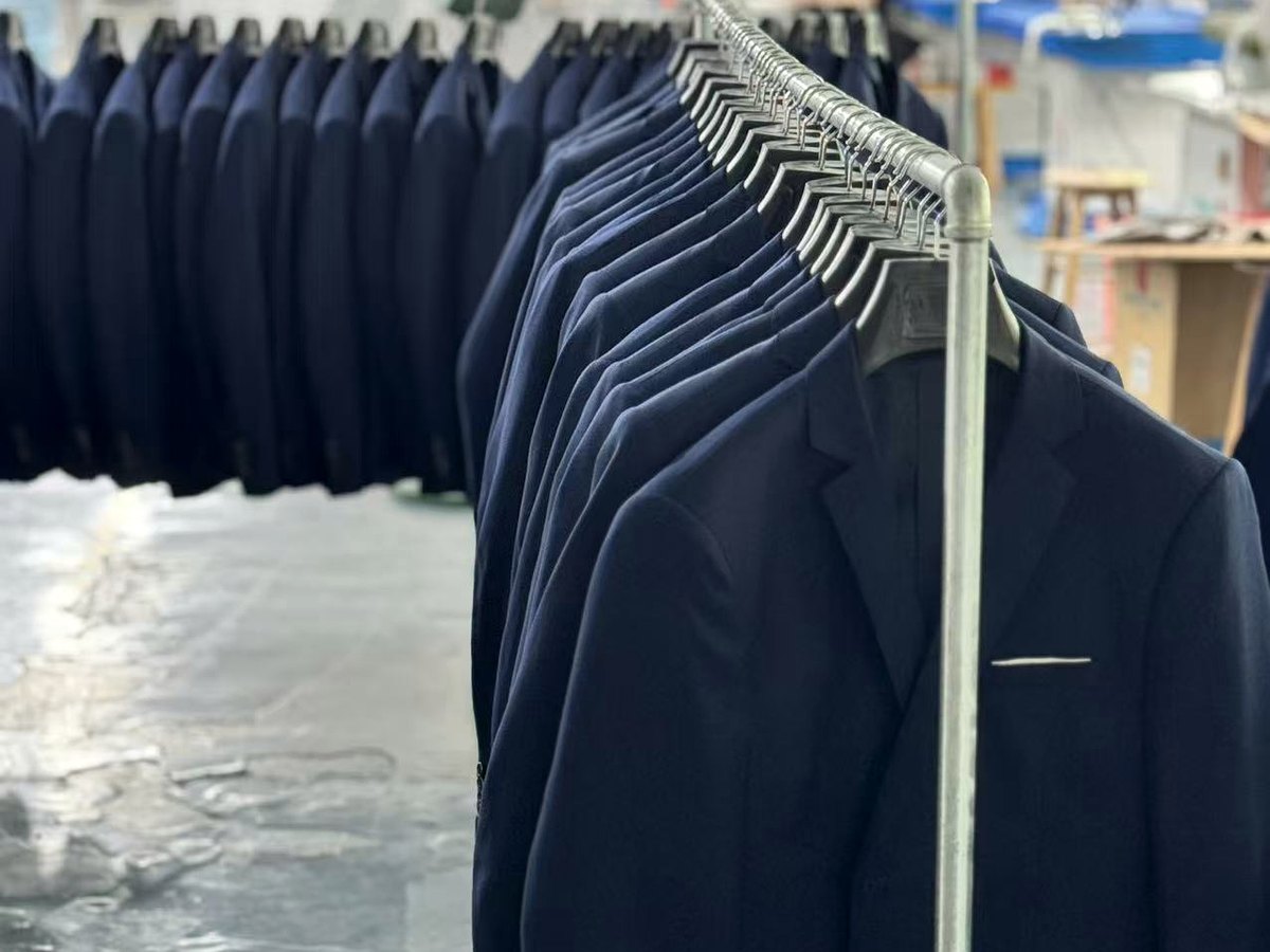 Finished suit rack for multi-store delivery readiness