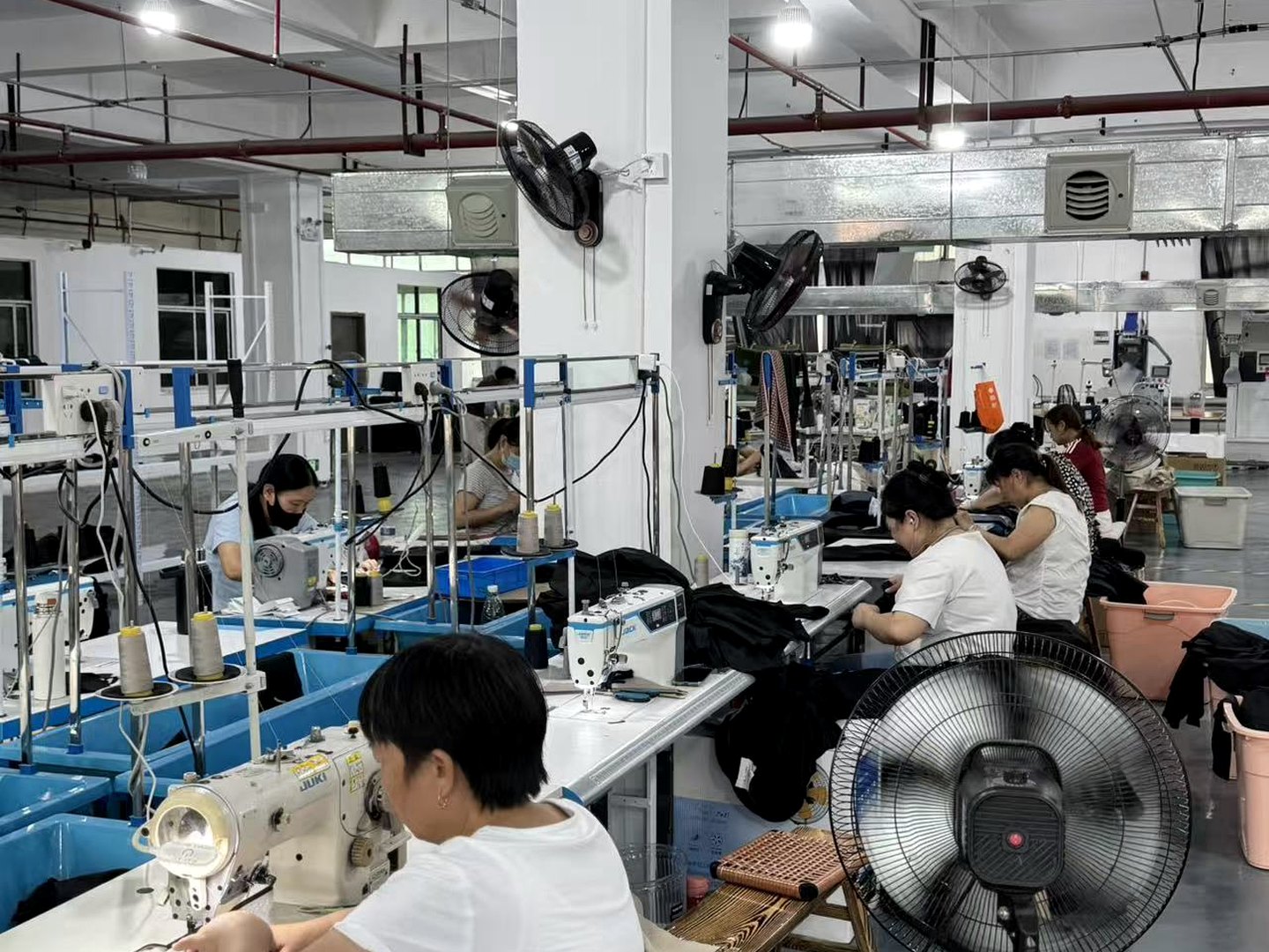 Owned sewing line used as production proof for wholesale suit orders