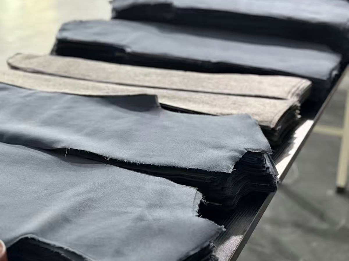 Finished garments prepared before shipment and balance-payment review