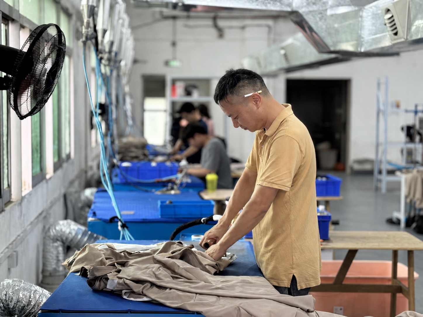 Pressing and finishing before custom suit shipment