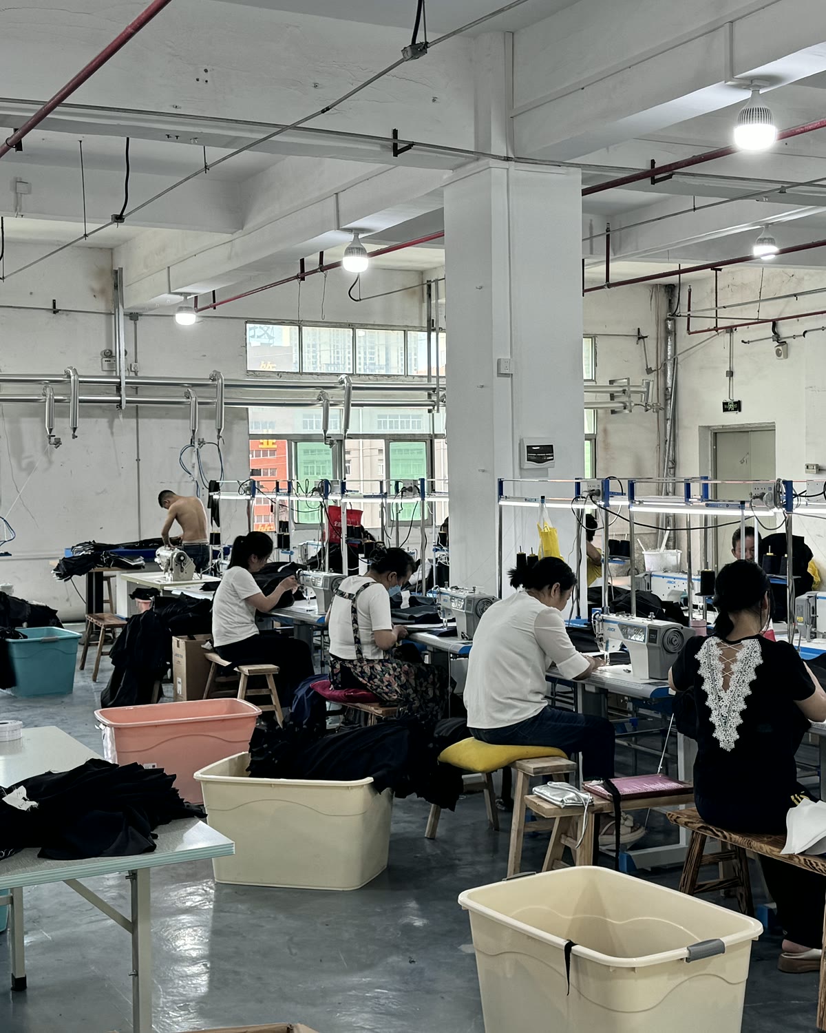 Sewing station for business uniform suit production planning